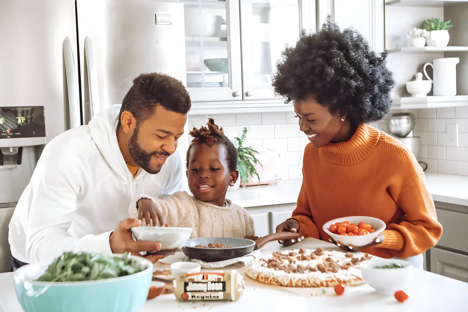 Family cooking a healthy meal at home
